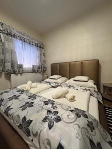 Postel nebo postele na pokoji v ubytování Hotel Zenubia