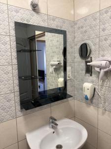 Koupelna v ubytování Hotel Zenubia
