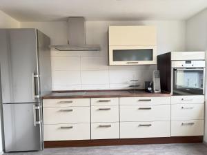 Kuchyň nebo kuchyňský kout v ubytování Helle und Charmante Dachgeschosswohnung in Top-Lage