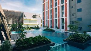 Bazén v ubytování The SIGAR at Sutera Bay 丝阁精品酒店 nebo v jeho okolí