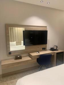 Postel nebo postele na pokoji v ubytování فندق حياة تاون ضبا