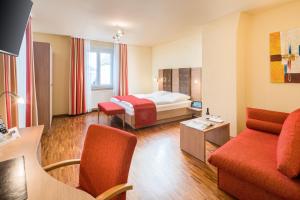 Postel nebo postele na pokoji v ubytování Hotel Zur Schmiede
