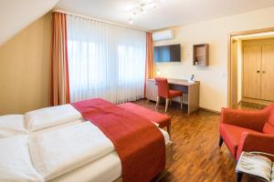 Postel nebo postele na pokoji v ubytování Hotel Zur Schmiede