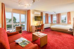 Postel nebo postele na pokoji v ubytování Hotel Zur Schmiede