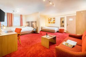 Postel nebo postele na pokoji v ubytování Hotel Zur Schmiede