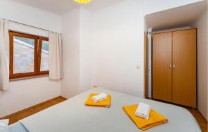 Posteľ alebo postele v izbe v ubytovaní Cozy Apartment In Modric With Wifi