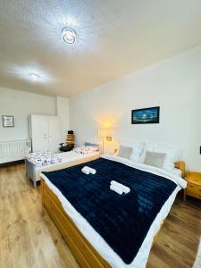 Postel nebo postele na pokoji v ubytování Kael Apartment