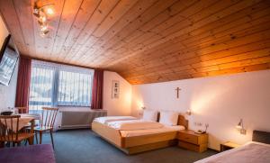 Ένα ή περισσότερα κρεβάτια σε δωμάτιο στο Gästehaus-Pension Barbara +74 φωτογραφίες