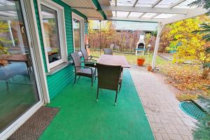 En have udenfor Bungalow am Berliner Stadtrand