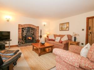 Et tv og/eller underholdning på Rowan Cottage