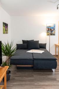 Voodi või voodid majutusasutuse Ferienwohnung am Labyrinth toas