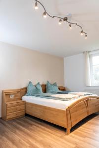 Voodi või voodid majutusasutuse Ferienwohnung am Labyrinth toas