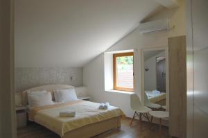 Postel nebo postele na pokoji v ubytování Hotel Sara