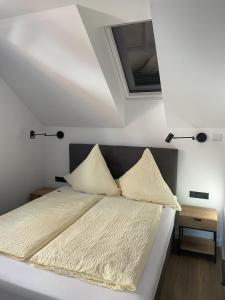 Postel nebo postele na pokoji v ubytování Haus Breslau + 10 fotografií