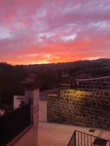 a sunset from the top of a building at Dimora Storica Silver Room in Ruviano
