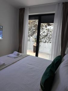 En eller flere senger på et rom på Apartman Little fox Divčibare