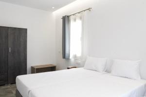 Posteľ alebo postele v izbe v ubytovaní Maistros Apartments Mykonos
