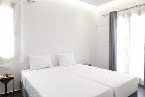 Posteľ alebo postele v izbe v ubytovaní Maistros Apartments Mykonos