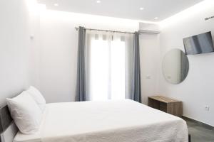 Posteľ alebo postele v izbe v ubytovaní Maistros Apartments Mykonos