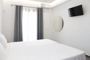 Posteľ alebo postele v izbe v ubytovaní Maistros Apartments Mykonos