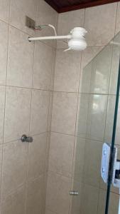 Koupelna v ubytování Cobertura no Centro do Balneário Arroio do Silva + 21 fotografií