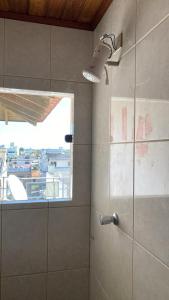 Koupelna v ubytování Cobertura no Centro do Balneário Arroio do Silva