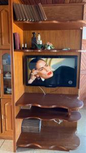 TV a/nebo společenská místnost v ubytování Cobertura no Centro do Balneário Arroio do Silva