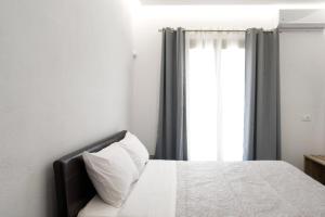 Posteľ alebo postele v izbe v ubytovaní Maistros Apartments Mykonos