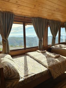 Postel nebo postele na pokoji v ubytování Vikend kuca Panorama