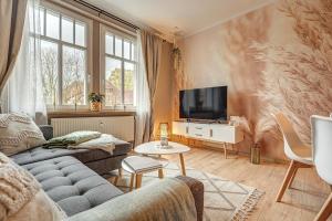 TV a/nebo společenská místnost v ubytování Ferienwohnung Ferdinand