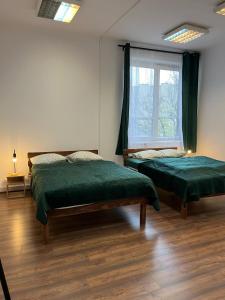 Postel nebo postele na pokoji v ubytování W94 Hostel