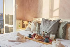 A bed or beds in a room at Appartamento a 100m dal mare e dal Gaslini