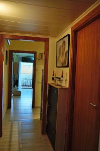 Televízia a/alebo spoločenská miestnosť v ubytovaní Arion Garden Apartment