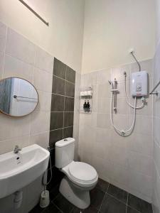 Ένα μπάνιο στο Polo Stay, 4 bedroom Single Storey house Ipoh for 10 pax