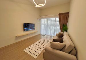 Μια τηλεόραση ή/και κέντρο ψυχαγωγίας στο Polo Stay, 4 bedroom Single Storey house Ipoh for 10 pax +13 φωτογραφίες