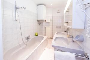 Koupelna v ubytování Apartment Welser + 26 fotografií
