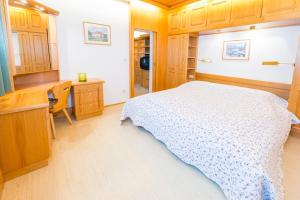 A bed or beds in a room at Apartment Welser