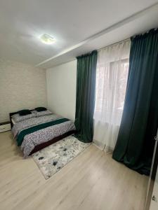 Postel nebo postele na pokoji v ubytování Apartament 2 camere