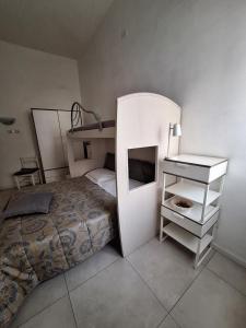 Posteľ alebo postele v izbe v ubytovaní Home il Piccolo Nido + 17 fotografií