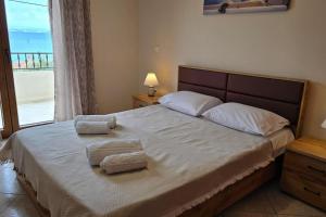 Ένα ή περισσότερα κρεβάτια σε δωμάτιο στο Calliestia 5