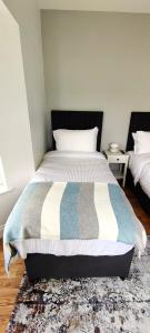 Una cama o camas en una habitación de Catherine's Place by the sea