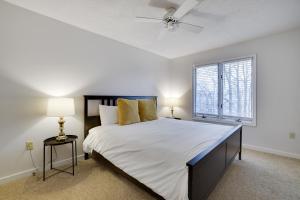 a bedroom with a large bed and a window at Lake Harmony Retreat Perfect Family Getaway in Lake Harmony