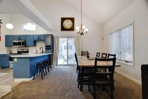 a kitchen and dining room with a table and chairs at Lake Harmony Retreat Perfect Family Getaway in Lake Harmony