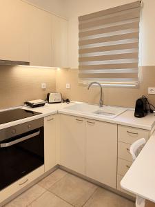 Η κουζίνα ή μικρή κουζίνα στο Casa Quattro by Immobilis +45 φωτογραφίες