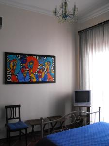A bed or beds in a room at B&B Casa Degli Artisti
