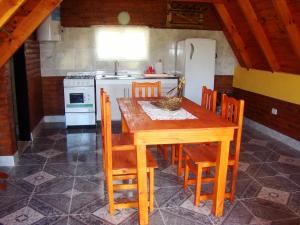 A kitchen or kitchenette at Cabañas Mirador del Cerro