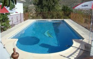 Bazén v ubytování Lovely Home In Iznájar nebo v jeho okolí