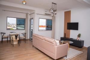 Телевизор и/или развлекательный центр в Charmant et cosy T3 à Cocody proche centre ville
