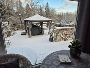 Mellene 1 bedroom house in nature & hot tube v zimě