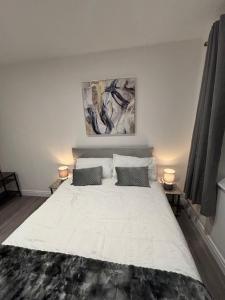 Ένα ή περισσότερα κρεβάτια σε δωμάτιο στο St Marks Court Apartments